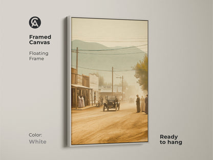 Framed canvas art in white. The artwork displays a sepia toned scene of an old western town. The floating frame offers a clean modern look. This ready to hang art print brightens up any room. Perfect for adding a subtle historical element to your decor.