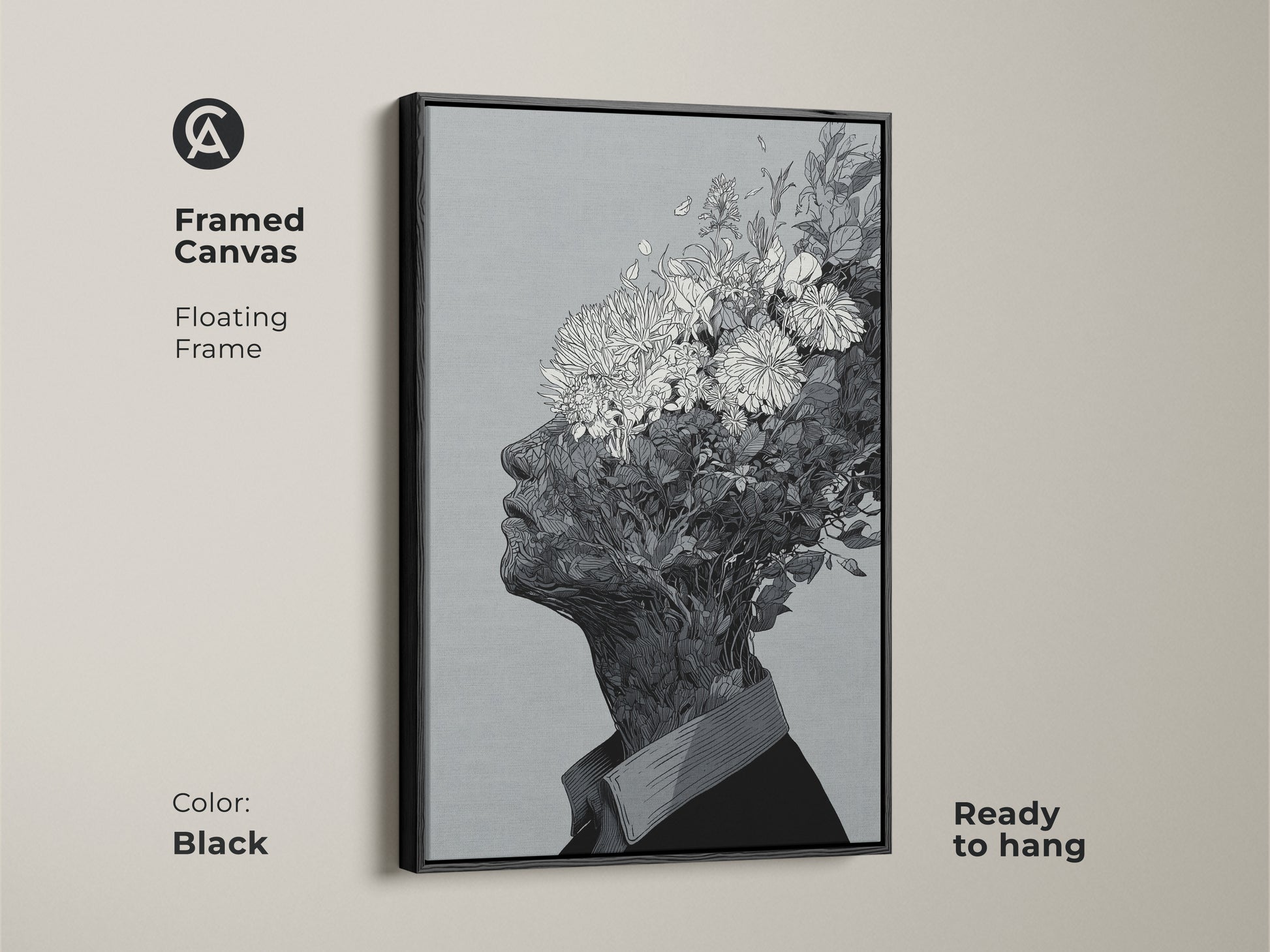 Framed canvas artwork with a floating frame. The art shows a black and white drawing of a floral head. This canvas comes in a black frame. It is ready to hang and will add a touch of elegance to your wall decor.