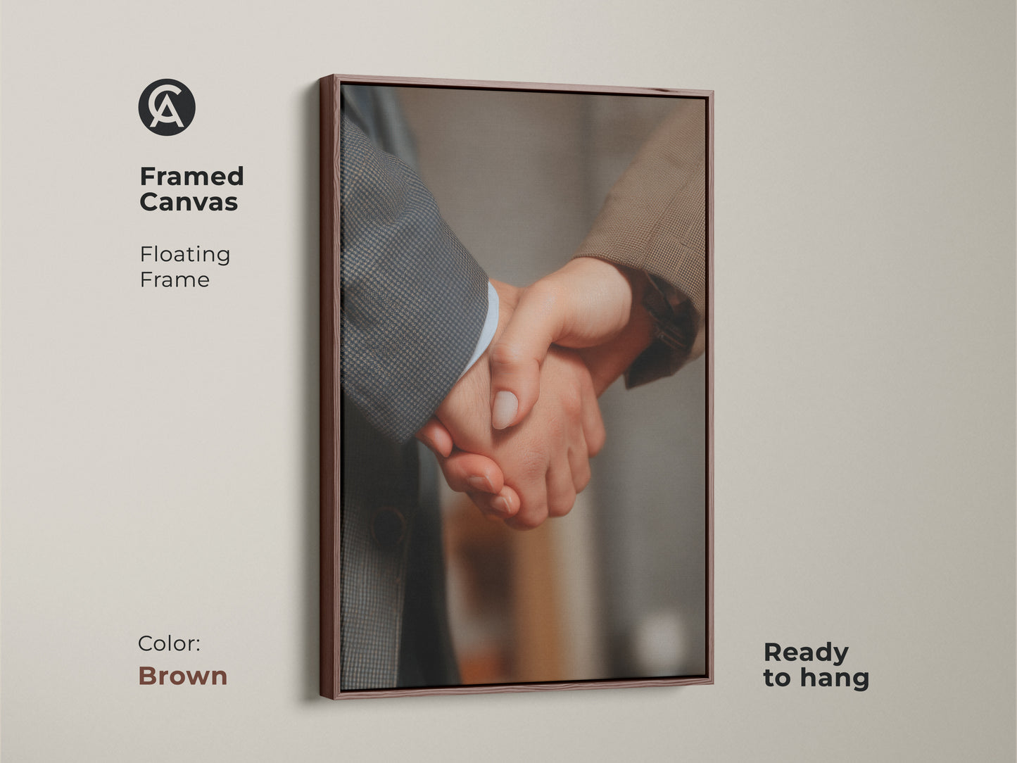 Framed handshake canvas art with a floating brown frame. Ready to hang. This business partnership artwork promotes corporate success. Ideal for modern office decor. A professional gift option. Neutral color palette complements any workplace. Symbolizes teamwork.