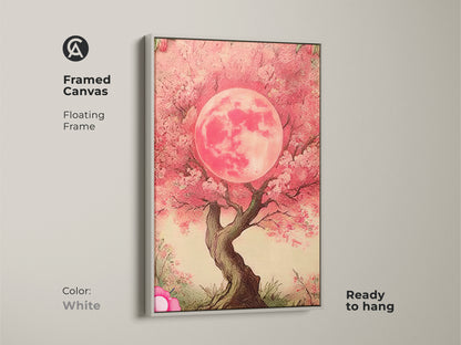 White framed canvas featuring a Pink Moon Tree. This floating frame showcases fuchsia floral art. Ready to hang dreamy botanical wall decor. This artwork will add some charm to your wall.