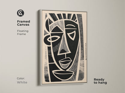 A framed canvas displays abstract face wall art. The white floating frame adds a clean look to the linocut print. This ready-to-hang piece enhances modern decor. It's perfect for a minimalist art print collection.