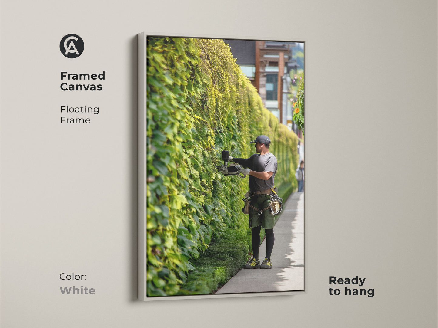 Framed canvas art showcasing a gardener trimming an ivy wall. The floating white frame enhances this ready to hang contemporary piece. A refined addition to any residential entryway decor.