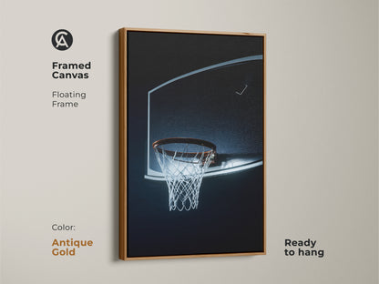 Framed canvas featuring a basketball hoop. The floating frame is antique gold. Ready to hang. A minimalist sports print with a black blue net. Ideal wall decor for a man cave or gym. A perfect gift for basketball lovers.