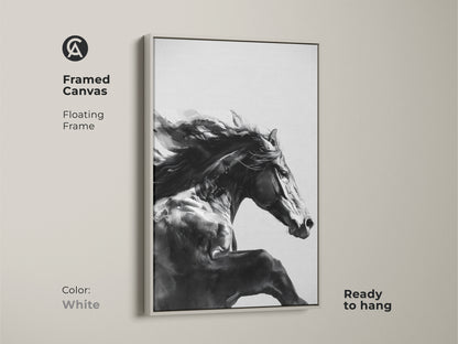 White framed canvas featuring black and white galloping horse art. Ready to hang this floating frame complements modern equine wall art decor. The powerful horse canvas enhances contemporary bedroom art. Perfect as a unique equestrian gift. A sophisticated choice for animal lovers.