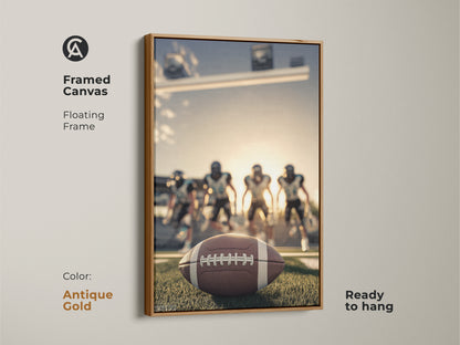 Framed canvas with an antique gold floating frame. It displays American Football artwork ready to hang. The artwork features a football on the field. Players are visible in the background. This wall decor is perfect for showing football team spirit.