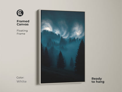 Framed canvas featuring a misty forest art print. The dark teal and midnight blue tones create a modern nature scene. Ready to hang with a white floating frame.