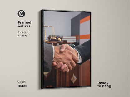 Framed canvas featuring handshake artwork perfect for a lawyer gift. Floating in a black frame it showcases scales of justice. Ready to hang this contemporary office art symbolizes a business agreement. Ideal for legal offices this dark brown and grey art promotes partnership and trust. Elevate your professional space with this sophisticated office decor.