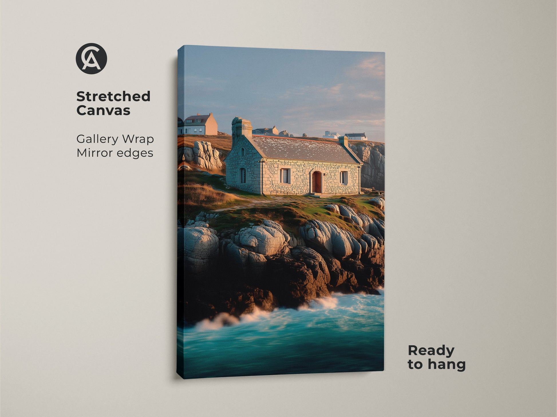Stretched canvas of coastal stone cottage artwork. Gallery wrapped with mirrored edges. Ocean waves art on canvas ready to hang. Blue green teal landscape art featuring a stone house on a rocky coastline. Travel inspired wall decor.