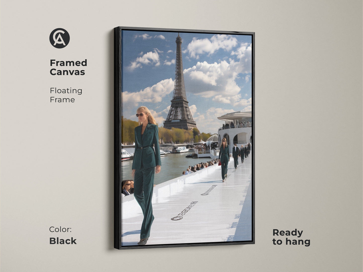 Framed canvas print of a Paris fashion show with a floating black frame. The artwork features models in teal green outfits set against the Eiffel Tower. This contemporary piece is ready to hang adding sophistication to any room. Ideal for those who love fashion and Parisian art.