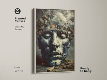 White framed canvas showcasing surreal face. This abstract figurative print uses a deep blue and charcoal palette. Ready to hang this artwork is a unique addition to any space. Great as office wall art.