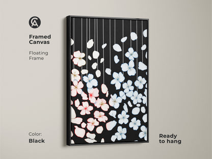 Framed canvas art presents minimalist cherry blossoms. The black botanical print features pink and white floral elements adding elegance. Ready to hang this floating frame enhances Scandinavian and modern home decor. It is a great housewarming gift bringing nature inspired artistry to any wall.