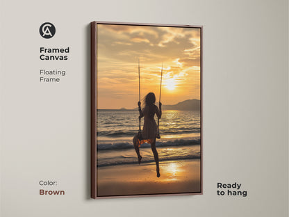 Framed canvas with a floating brown frame. The artwork shows a woman on a swing silhouetted against a golden sunset. This boho coastal wall art is perfect for adding a touch of travel to your decor. The warm tone abstract wall art is ready to hang. Great as a family vacation memory art.