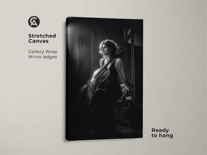 Stretched canvas of a cellist in black and white. Gallery wrap with mirrored edges offers a modern look. Ready to hang this musician portrait adds a fine art touch. Ideal for contemporary music room decor or as a gift for a music lover. The monochrome portrait enhances any wall.