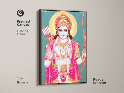 Framed canvas of Lord Rama wall art with a brown floating frame. Ready to hang religious artwork. The teal gold and pink palette makes it an eye-catching deity print.
