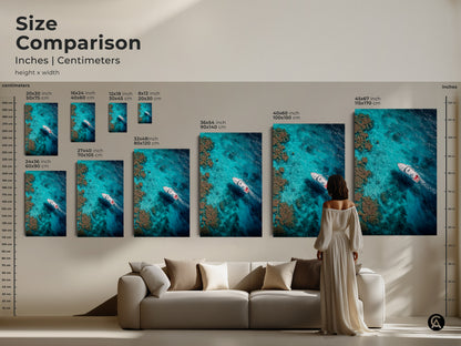 Size comparison of art prints. The artwork depicts a boat sailing on clear turquoise waters. See how each size fits above a sofa to visualize the impact of this beautiful ocean-themed art.
