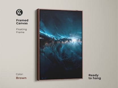 This is a framed canvas nebula artwork. The art features shades of dark blue and white. The frame is a warm brown color. This framed art is ready to hang. It features a floating frame. Purchase this framed artwork today