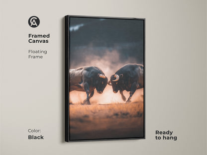 Black framed canvas art featuring two bulls battling. The floating frame adds depth. It comes ready to hang. This piece brings bold energy to your space. Discover framed animal artwork for your home.