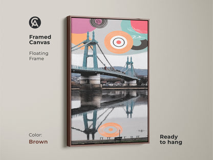 Framed canvas with a floating frame is ready to hang. Brown frame complements the abstract geometric art. Aqua and coral colors highlight the suspension bridge print. This is modern cityscape wall art and a contemporary entryway decor piece. Its a unique art print for the office.