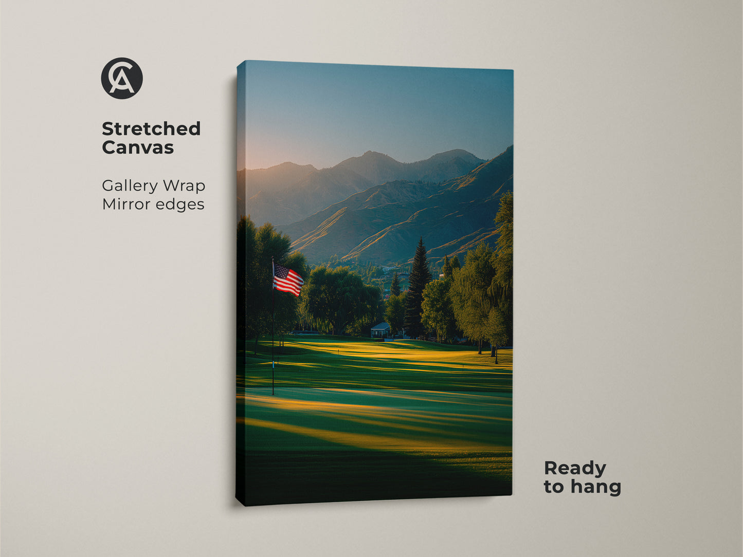 Stretched canvas art showing a beautiful golf course scene. The American flag is proudly displayed. A stunning mountain range is visible. This gallery wrapped canvas is ready to hang. Order now for a touch of nature.