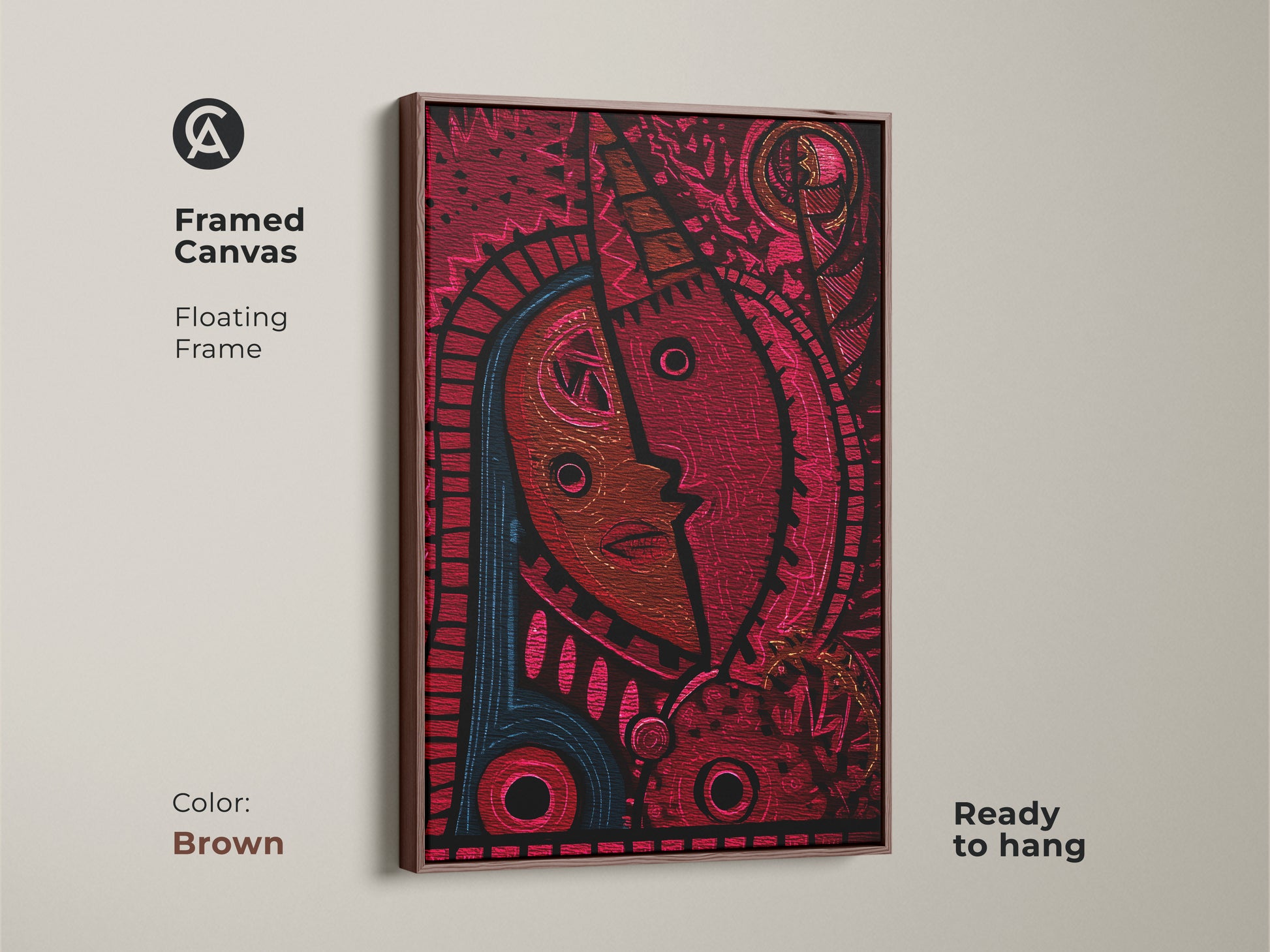 Framed canvas with a brown floating frame showcases the abstract face. The red and magenta tribal mask artwork adds warmth. Ideal for an entryway it's ready to hang. This eclectic piece is a unique housewarming gift.