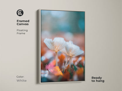 White framed canvas art displaying white mushrooms. This floating frame art print is ready to hang. The nature artwork complements any wall color. This canvas print adds a clean fresh touch. It is visually pleasing.