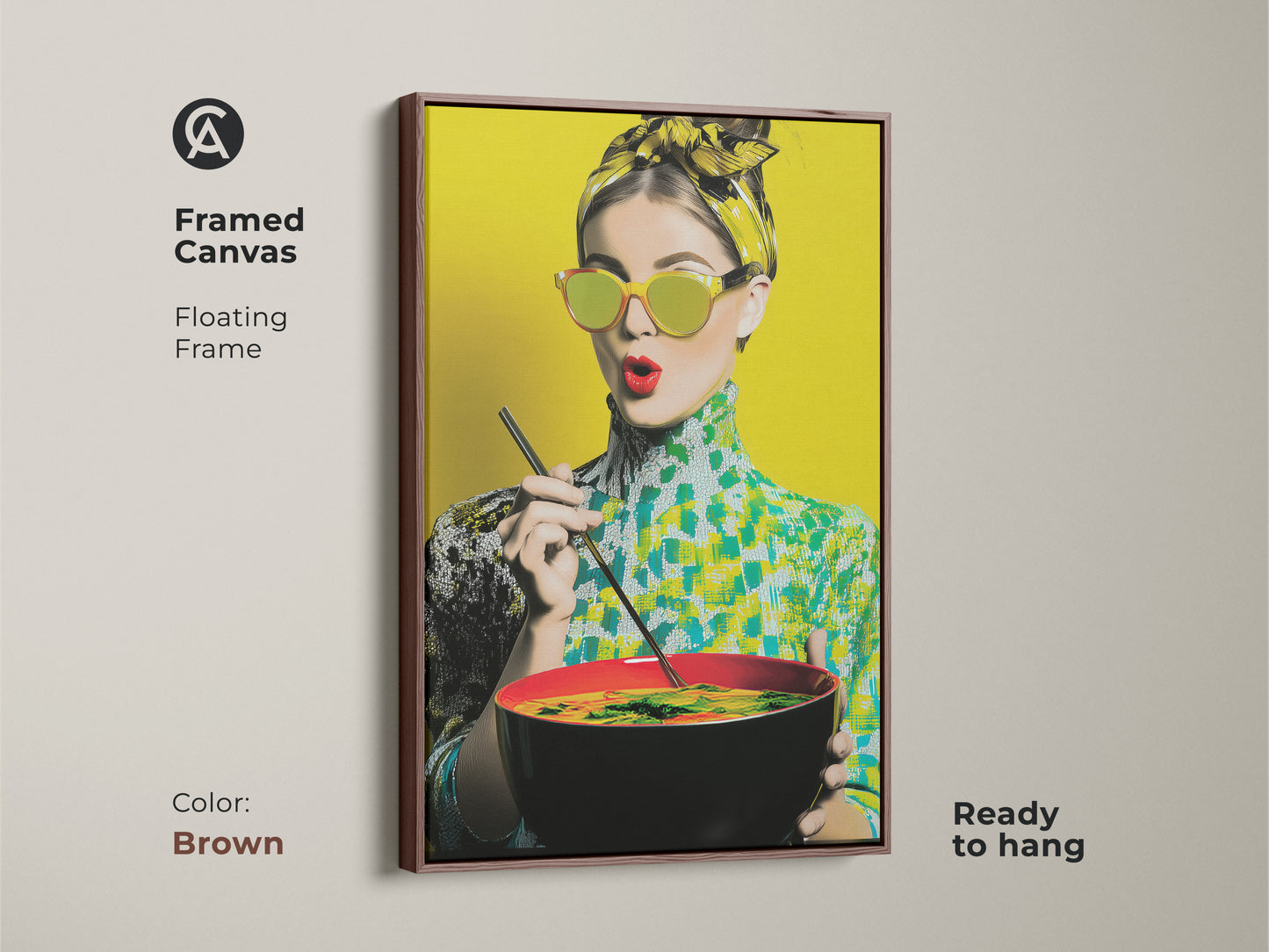 Framed canvas with a brown floating frame displaying a pop art woman enjoying noodles. This retro-style artwork is ready to hang. The vibrant yellow and teal colors make it a unique kitchen art piece. Perfect for foodie fashion.