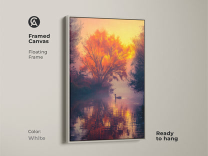 White framed canvas art of a sunset landscape. A swan swims on a misty lake. An orange tree is reflected on the water. Floating frame. Ready to hang in your home or office. Order today.