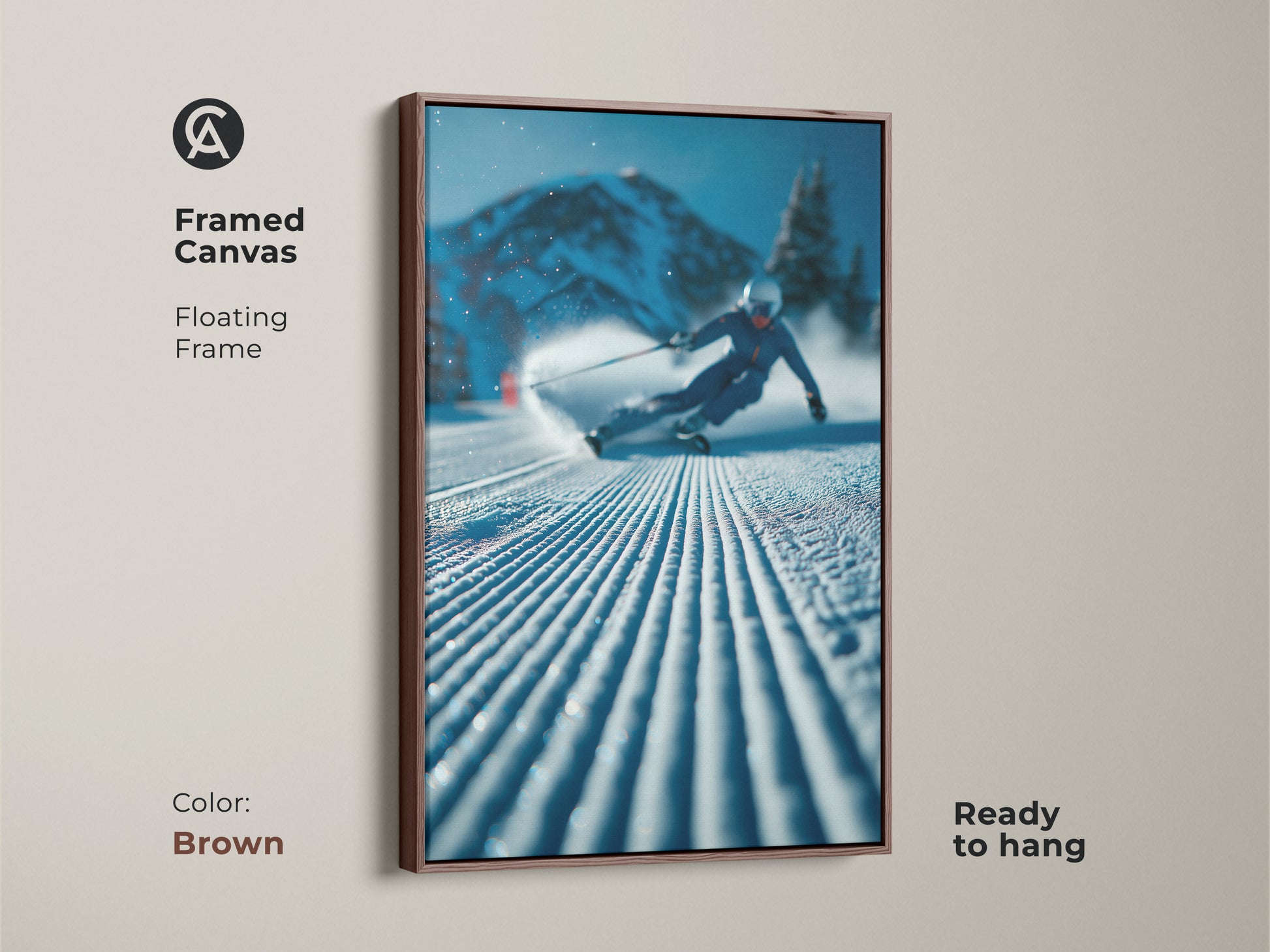 Framed canvas art showcasing a skier. The floating frame enhances the visual appeal of this winter sports artwork. Ready-to-hang this piece adds a touch of adventure to your decor. The brown frame brings warmth to the snowy scene.