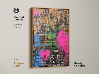 Framed abstract cityscape canvas art in an antique gold floating frame. Graffiti heart artwork features pink orange and green. Ready to hang this eclectic wall decor adds style to any home. A perfect art gift for those who love urban themes.
