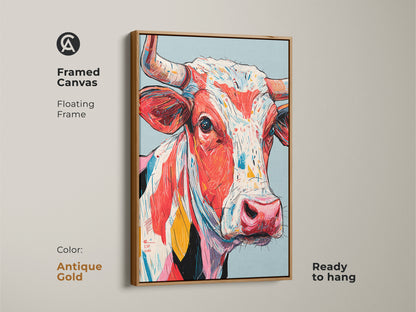 Framed canvas print of a colorful cow artwork with an antique gold floating frame. This ready-to-hang art adds elegance. The framed art enhances the vibrant colors. A stylish choice for your home decor.