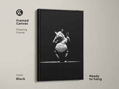 Framed canvas with floating frame showcasing sophisticated rhino artwork. This ready to hang black frame highlights the monochrome bar decor. Add a touch of humor with this black and white animal poster. A unique gift for wine enthusiasts animal lovers. A modern man cave art or office wall decor animal.
