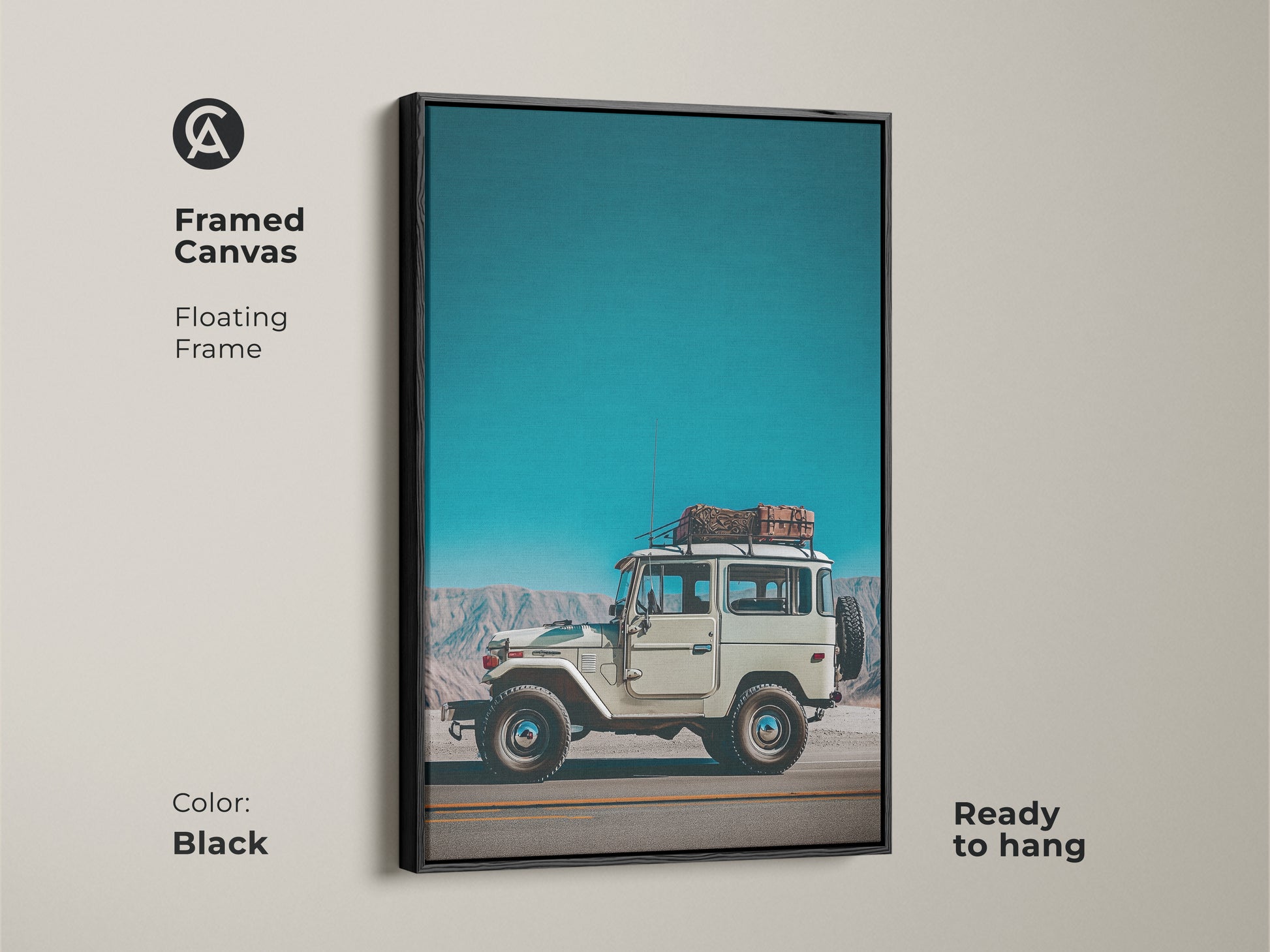 Framed canvas featuring a vintage SUV with a floating frame in black. This retro mountain landscape artwork is ready to hang. The teal sky blue adventure photography suits an industrial loft.