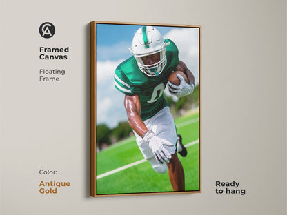 Football player canvas art in a framed contemporary style. The antique gold floating frame enhances the emerald green sports print. This ready-to-hang piece brings athletic action to your decor. Ideal as a gift for the football fan.