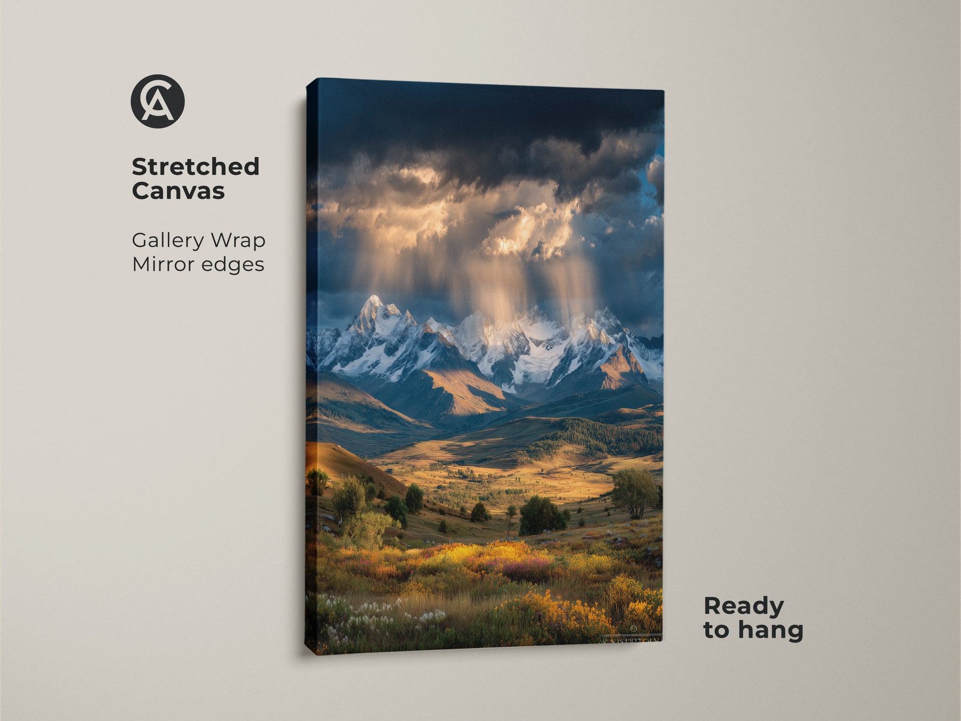 A stretched canvas print showcases a mountain landscape. Gallery wrapped with mirrored edges it's ready to hang. Snowy mountains wildflowers and golden light create stunning wall art. Ideal for modern farmhouse or rustic cabin decor.