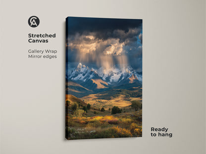 A stretched canvas print showcases a mountain landscape. Gallery wrapped with mirrored edges it's ready to hang. Snowy mountains wildflowers and golden light create stunning wall art. Ideal for modern farmhouse or rustic cabin decor.