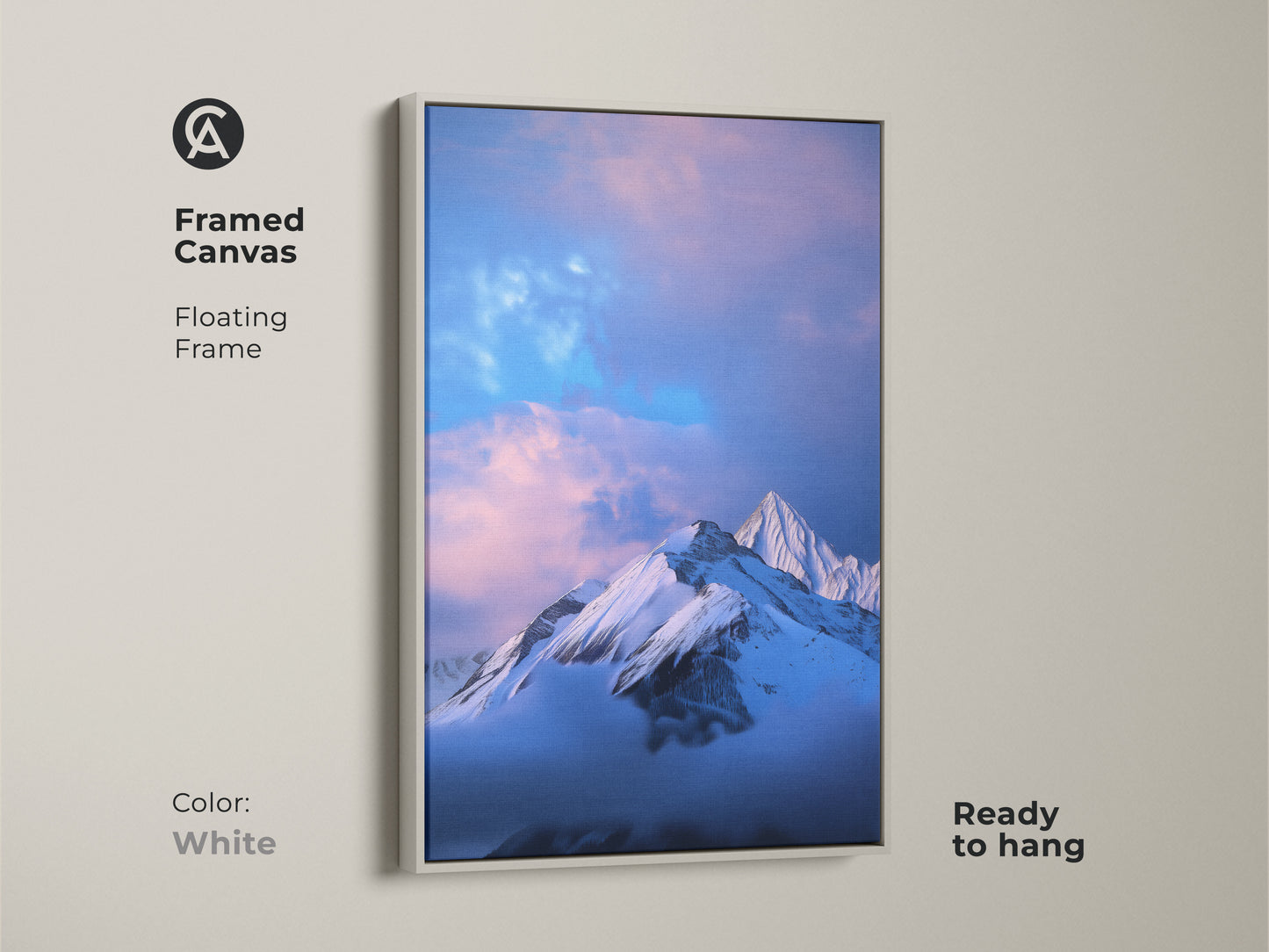 Framed canvas print of a snowy mountain with a white floating frame. This blue nature art is ready to hang. The photorealistic artwork adds a modern touch. Perfect wall decor for bedrooms. An outdoor lover gift.