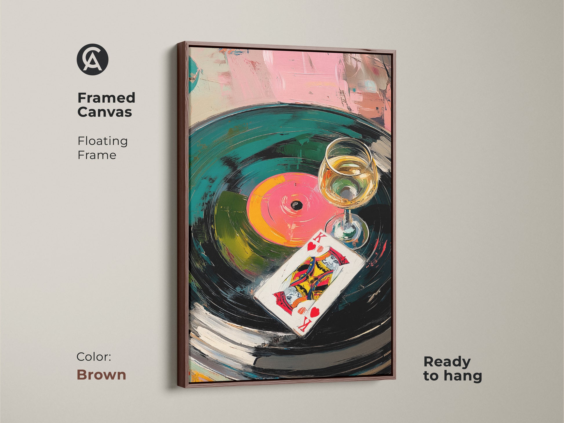 Framed canvas featuring abstract vinyl record artwork. A King of Hearts card print adds character. The brown frame enhances the teal green and pink palette. This ready-to-hang artwork is perfect for music lovers. Eclectic home decor.