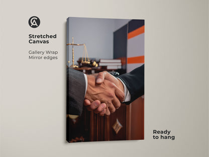 A stretched canvas featuring handshake artwork perfect as a lawyer gift. The gallery wrapped canvas showcases scales of justice with mirror edges. Ready to hang this contemporary office art symbolizes a business agreement. Ideal for legal offices this dark brown and grey art promotes partnership and trust. Elevate your professional space with this sophisticated office decor.
