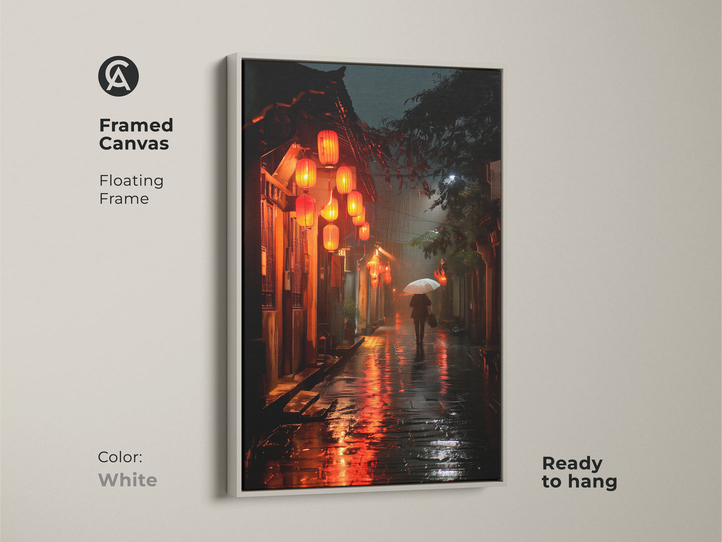 A framed canvas print capturing a rainy Asian street scene. The clean white floating frame adds a modern touch to the artwork. Red lanterns cast a warm glow on the wet pavement. A lone figure with an umbrella walks away. This print is ready to hang.