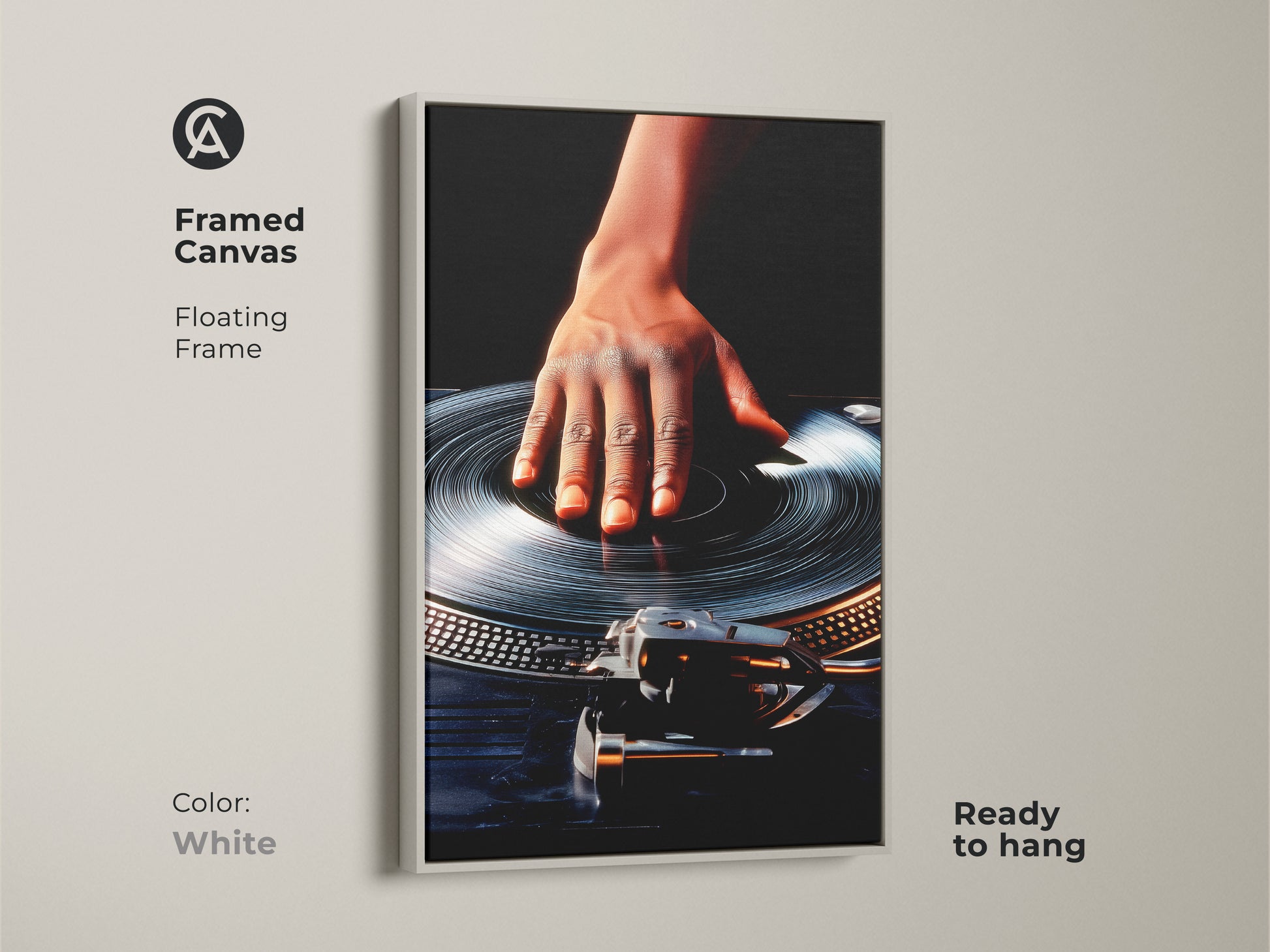 White framed canvas shows hand on turntable art. Floating frame adds a modern touch this canvas is ready to hang. Ideal for an office music studio or workplace. The retro DJ artwork uses an orange and black color scheme. A great gift for music lovers and those in DJ culture.