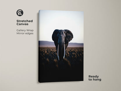 Stretched canvas print featuring a photorealistic elephant. Gallery wrapped with mirrored edges this African wildlife wall art is ready to hang. Enhance your home with this savanna landscape art.