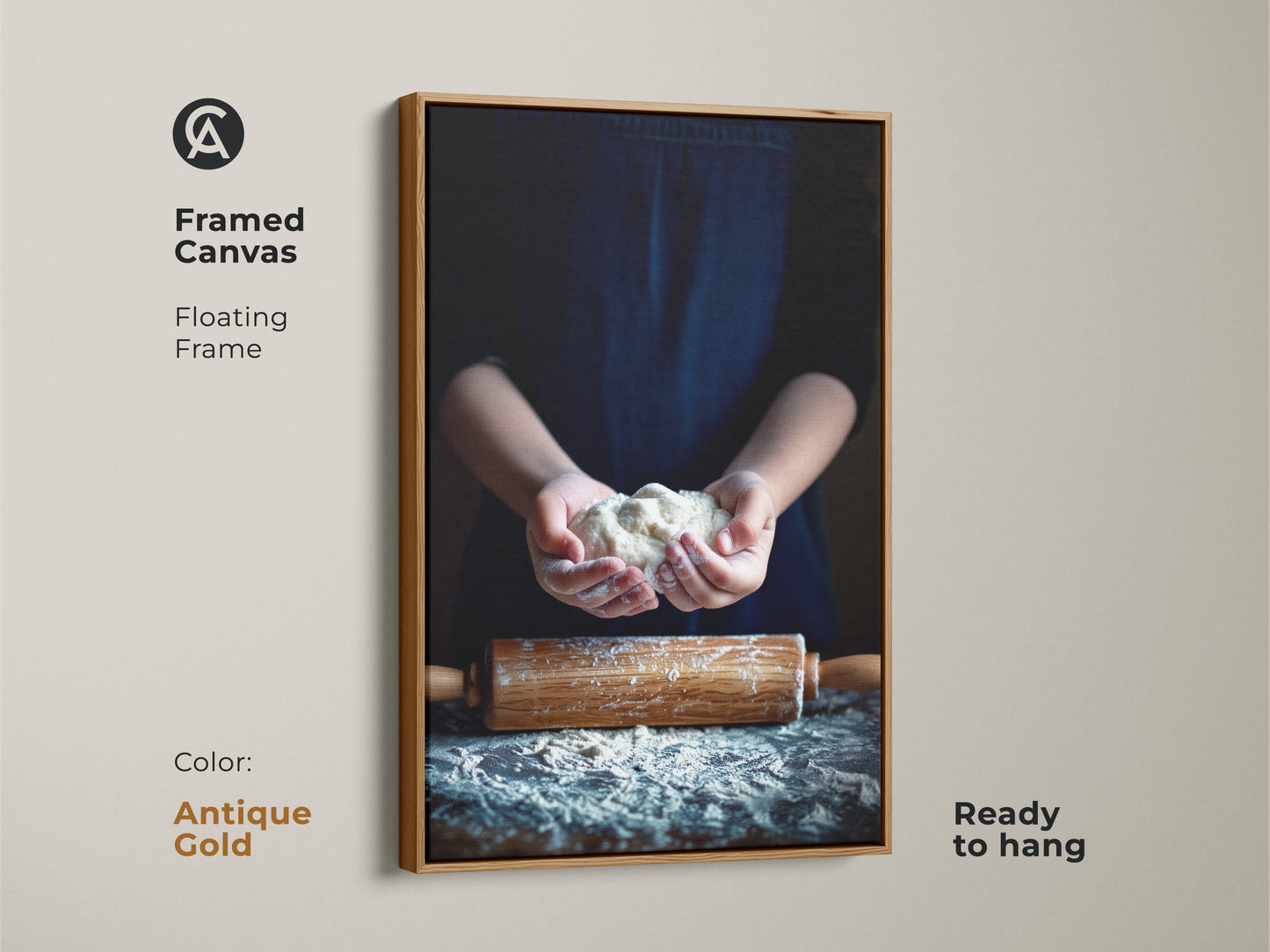 Framed canvas art displays hands holding dough. The floating frame is antique gold. This rolling pin art kitchen decor is ready to hang. A housewarming gift for bakers.