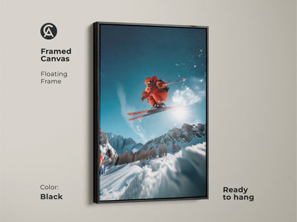 Framed canvas art of a freestyle skier. Black floating frame enhances the image. The skier is captured mid-jump against a sunny mountain backdrop. Ready to hang this artwork adds a modern touch. Perfect for sports lovers and contemporary homes