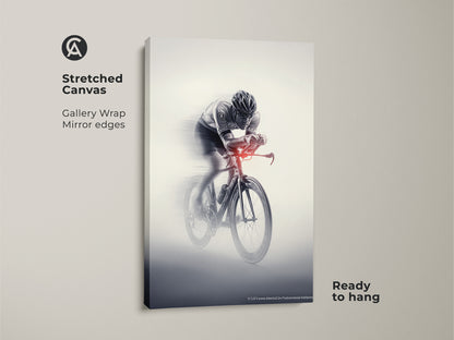 Stretched canvas print of a cyclist in motion. This gallery-wrapped monochrome art has mirrored edges. The racing bicycle canvas comes ready to hang. Featuring sports speed wall art. This dynamic cyclist decor is an inspiring piece.