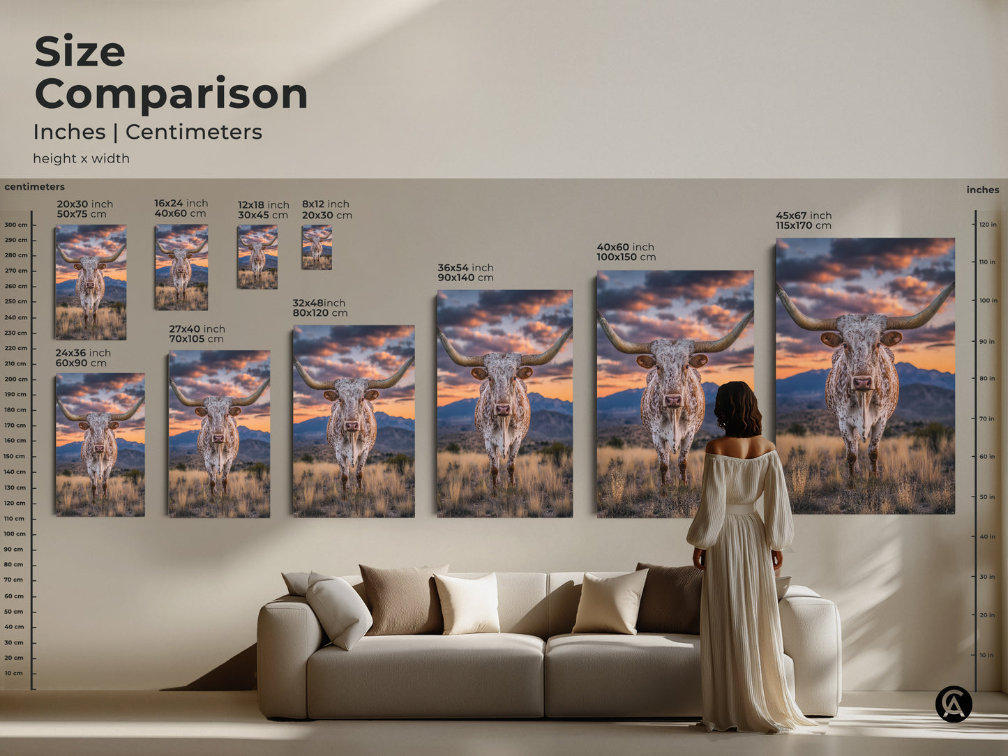 Size comparison of longhorn steer canvas art in inches and centimeters. See how the rustic western landscape fits above a couch. This farmhouse artwork is perfect for a living room. It's a unique cowboy gift.