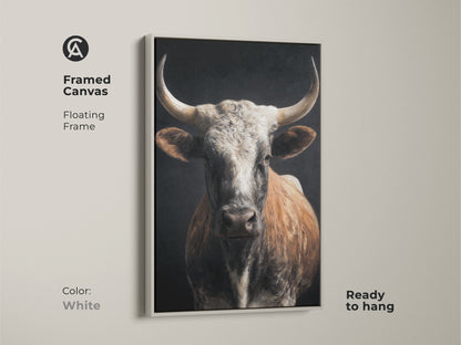 Framed canvas featuring realistic bull artwork with a floating frame in white. The tan white and brown tones enhance its rustic animal print decor. Ready to hang. The farmhouse cow wall art adds charm to any space. Perfect for country style home decor. This wildlife farm animal art is a stunning focal point.