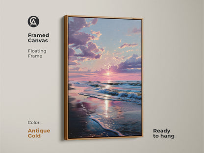 Antique gold framed canvas sunset beach art. Floating frame adds a luxurious touch. The sun reflects on the wet sand. Ocean waves crash on the beach. This framed art is ready to hang. Transform your home decor today.