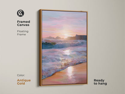 Framed canvas showing an ocean sunset and coastal beach waves. An antique gold floating frame complements the teal pink orange sky. Ready to hang wall art adds summer to your bedroom or living room. Perfect as a home decor canvas.