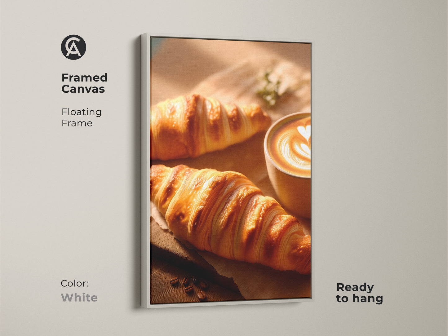 Framed Canvas with a white floating frame displaying croissant and latte art. Contemporary art print ideal for breakfast room wall art. Adds a touch of elegance to any beige and brown kitchen decor.