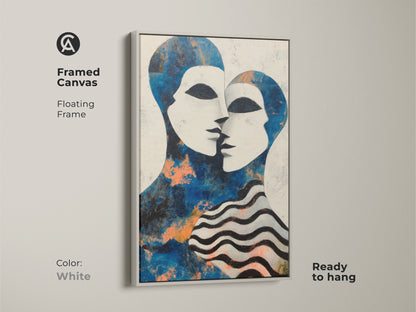 Framed canvas showcasing the abstract portrait print. The modern style of this couple art is striking. It's a perfect blue and white wall art piece. Ideal as a contemporary couple gift or for eclectic bedroom decor.
